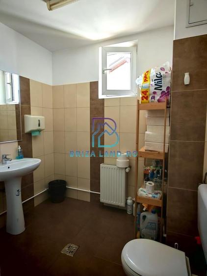 Casă individuală cu 10 camere cu Canalizare în 1 Mai
