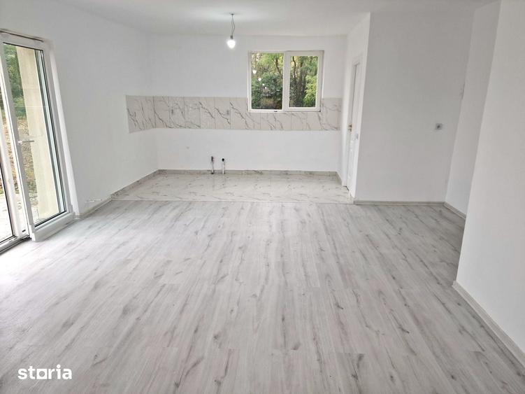 Casă cu 4 camere cu Teren 1000 Mp în Căianu