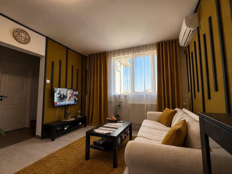 Apartament cu 2 camere semidecomandat, mobilat în 1 Mai