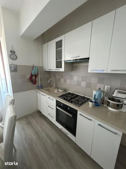 Apartament cu 2 camere decomandat în Podu Roș