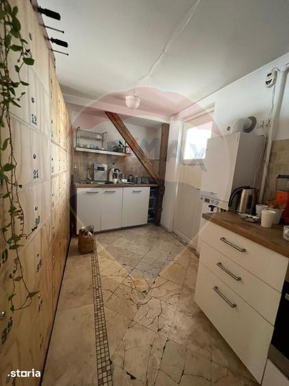 Apartament cu 4 camere în Romană