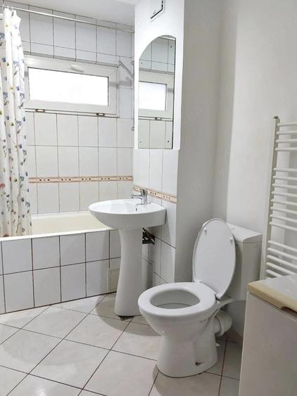 Apartament cu 2 camere semidecomandat în Podu Roș