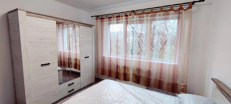 Apartament cu 2 camere decomandat în Crișeni