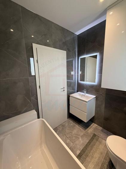 Apartament cu 2 camere decomandat, mobilat în