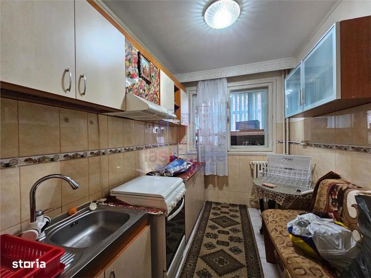 Apartament cu 2 camere decomandat în Podu Roș — fotografia 1