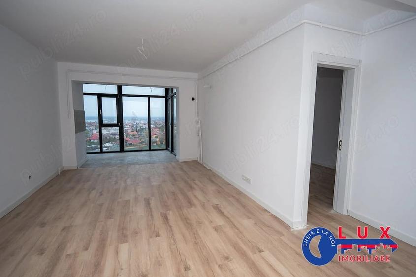 Apartament cu 2 camere decomandat în E3