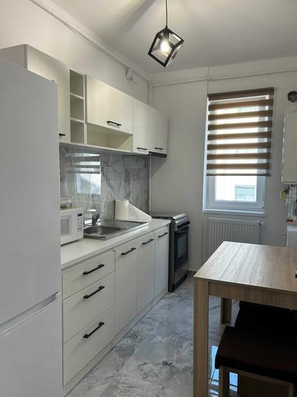 Apartament cu 2 camere decomandat în Roșu