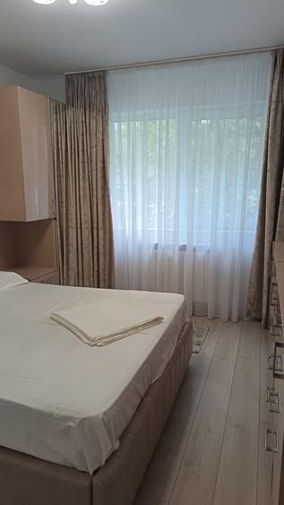 Apartament cu 2 camere, mobilat în Central