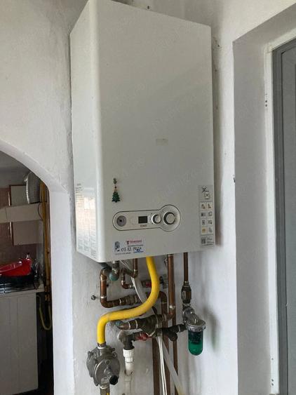 Casă cu 4 camere cu Teren 400 Mp în Central