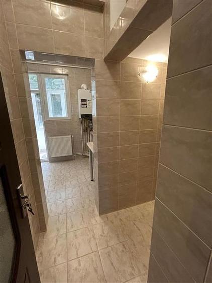 Apartament cu 3 camere decomandat în Magheru