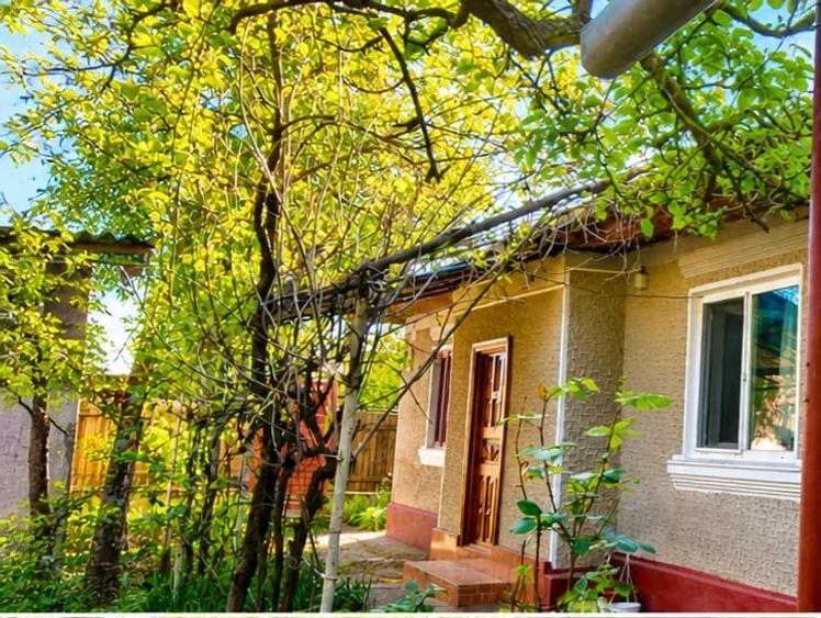 Casă cu 4 camere cu Teren 600 Mp în Central