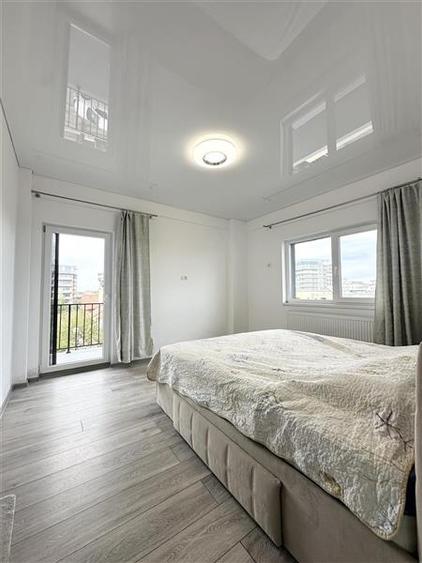Apartament cu 3 camere semidecomandat, mobilat în Nord