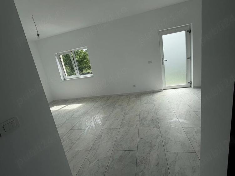 Casă cu 4 camere cu Teren 506 Mp în Tomești