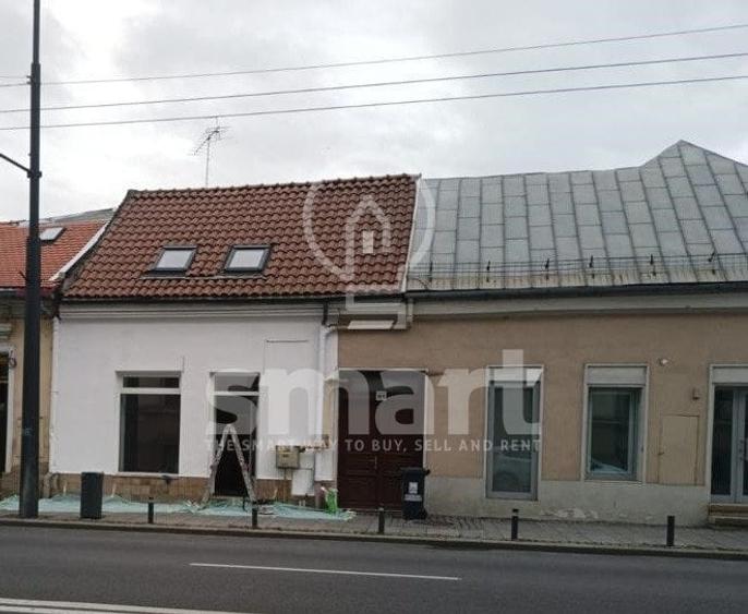 Casa cu spatiu comercial si locuinta 100 mp, strada Motilor - 10