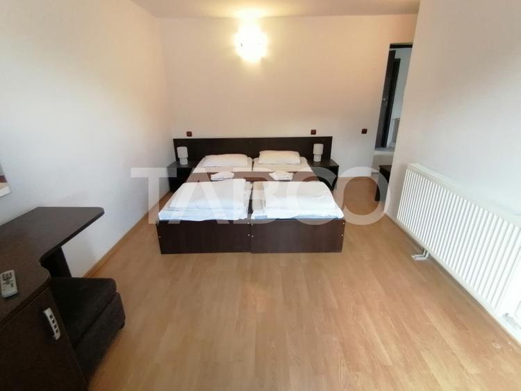 Pensiune 13 camere 16 bai sauna piscina si teren 1565 mp Cisnadioara - 21