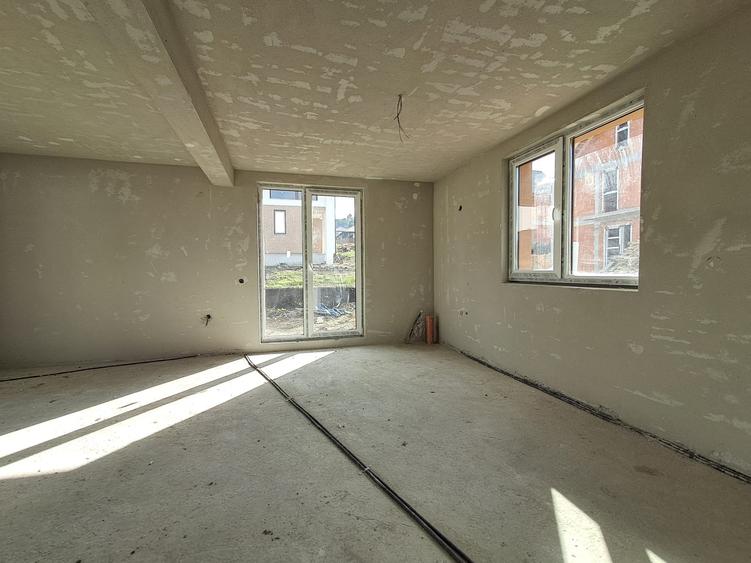 Casa cuplata prin garaj 23 mp, sup. totala 147 mp P+E in Chinteni - 9