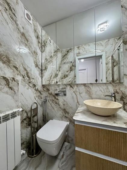 2 camere renovat la 5 minute de Metrou Stefan cel Mare - 10