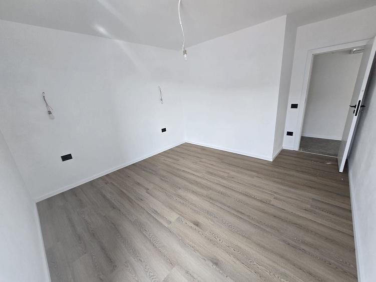 Apartament superb pe 2 niveluri. Bucatarie inchisa. 2 Locuri de Parcare. - 10
