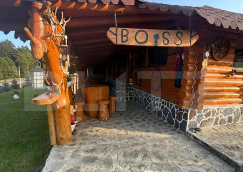 Cabana din lemn rotund, 2 camere, 140 mp, teren 2800 mp, Pal - 12