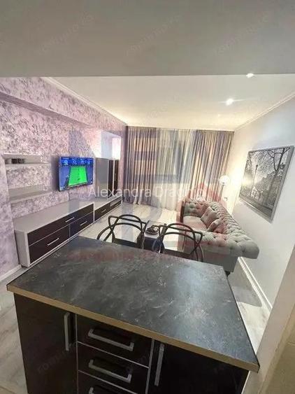 Apartament 2 camere cu loc de parcare de inchiriat RIN Grand Residence