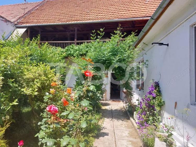 Casa 214 mp utili singur in curte 800 mp teren zona centrala Cisnadie - 17