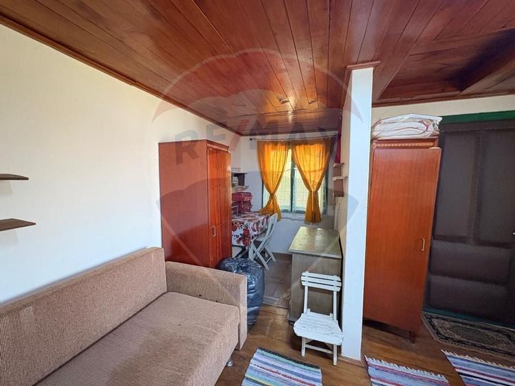 Teren intravilan 589 mp si cabana din caramida in Cuvin - 1