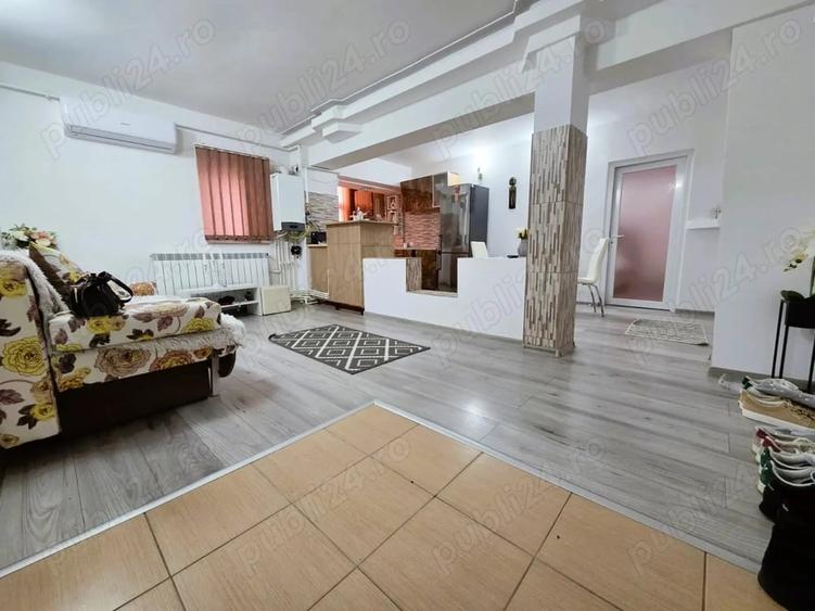Apartament cu 4 camere decomandat în E3