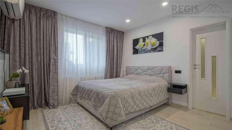 Apartament cu 4 camere decomandat în Tractorul