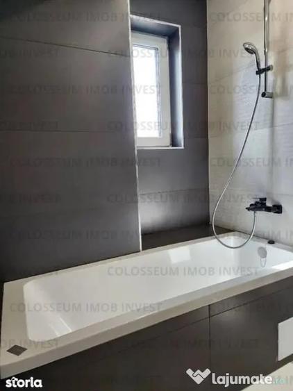 Apartament cu 4 camere decomandat în Tractorul