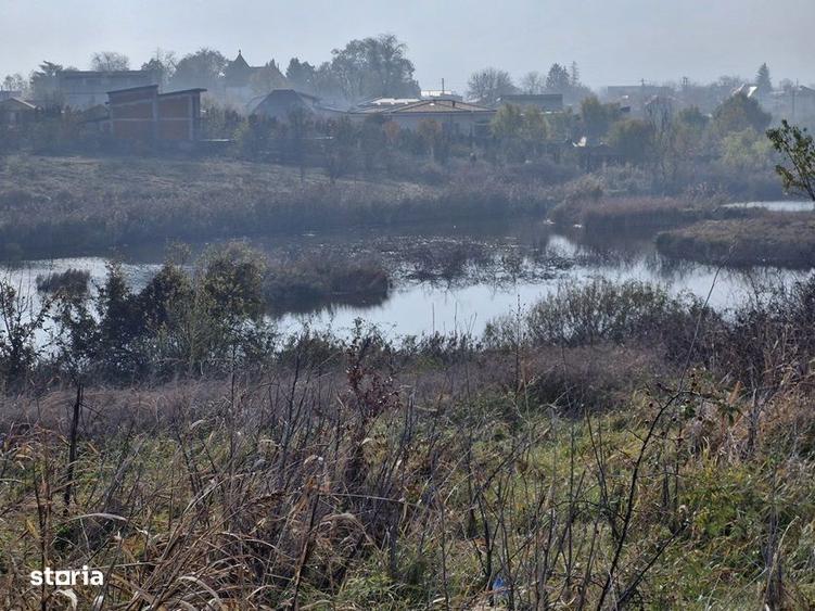 Teren langa case cu utilitati, lac la 300 metri,700 mp, 38500 euro - 4