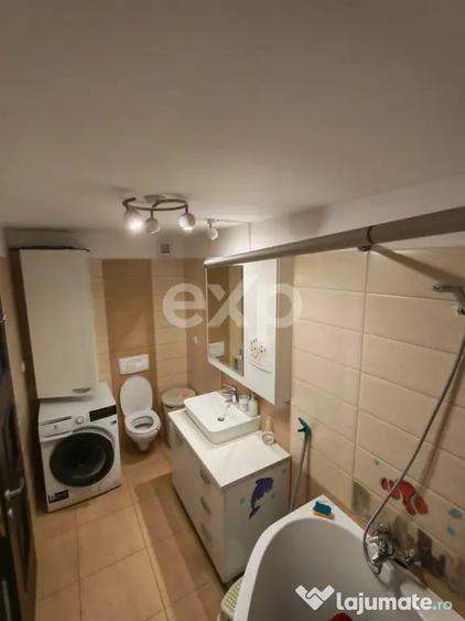 Apartament cu 3 camere decomandat în Tractorul