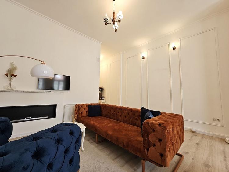 Apartament cu 3 camere semidecomandat, mobilat în Central