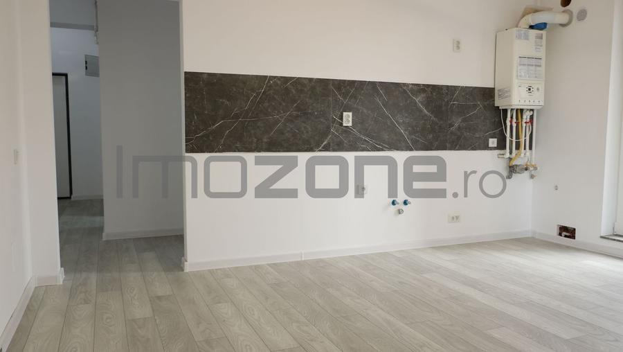 3 CAMERE LA PARTER CU CURTE PROPRIE DE 57MP,  2 BAI, POZITIE PE SUD, COMISION 0% - 9