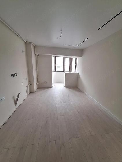 3 camere decomandate Baia Comunala etajul 1 - 2