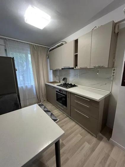 Apartament cu 2 camere semidecomandat, mobilat în Podu Roș