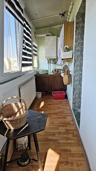 Apartament cu 3 camere decomandat în Tractorul
