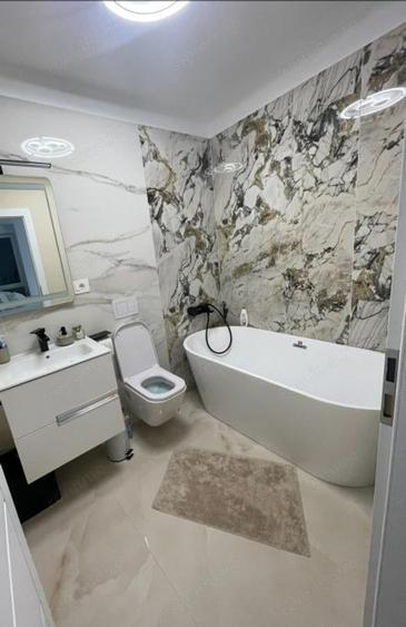 Apartament cu 4 camere decomandat în Central