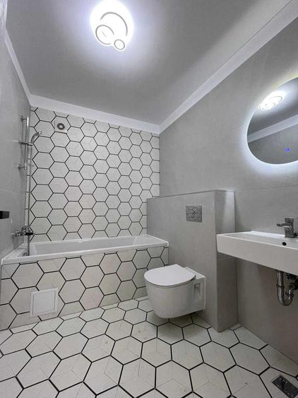 Apartament cu 3 camere decomandat în Tractorul