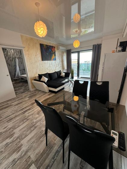 Apartament cu 2 camere decomandat, mobilat în Central — fotografia 3