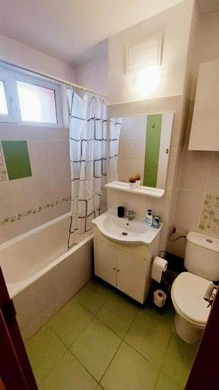Apartament cu 2 camere semidecomandat, mobilat în Podu Roș