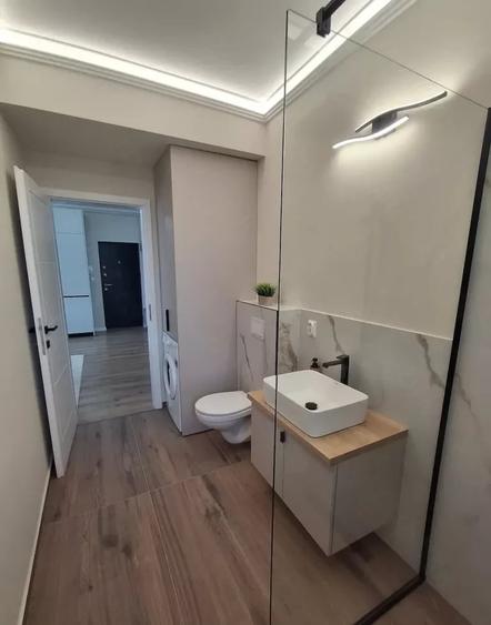 Apartament cu 2 camere semidecomandat, mobilat în Baciu
