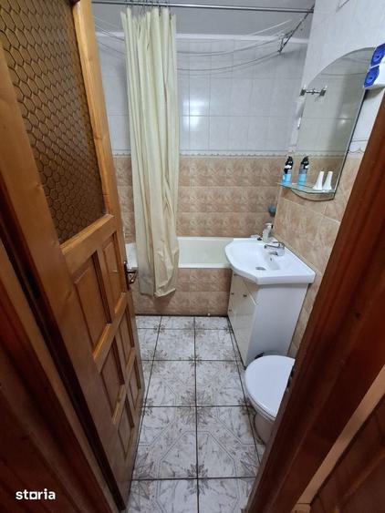 Apartament cu 2 camere decomandat în Podu Roș