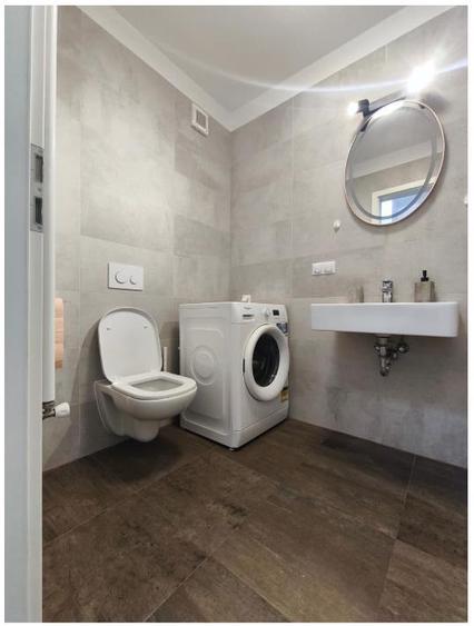 Apartament cu 2 camere semidecomandat, mobilat în Tractorul