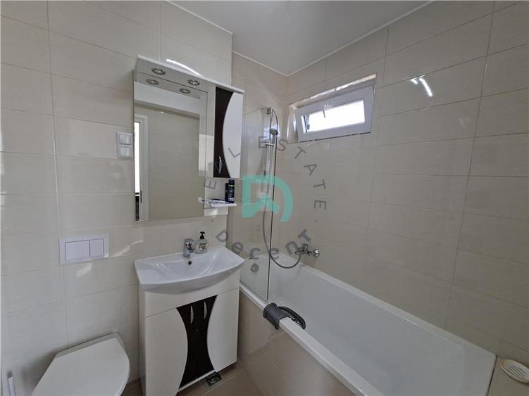 Apartament cu 4 camere decomandat în Tractorul