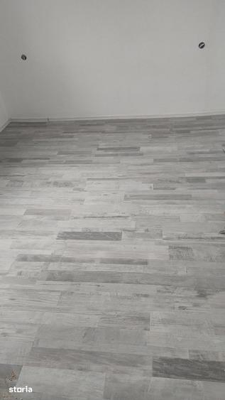 Casă cu 4 camere cu Teren 200 Mp în Central