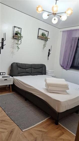 Apartament cu 3 camere decomandat, mobilat în Central