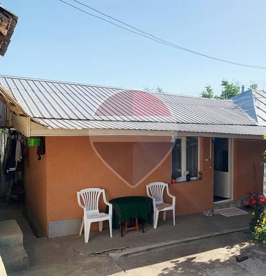Casă cu Teren 1043 Mp în Dochia