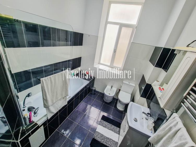 Apartament cu 3 camere semidecomandat, mobilat în Central