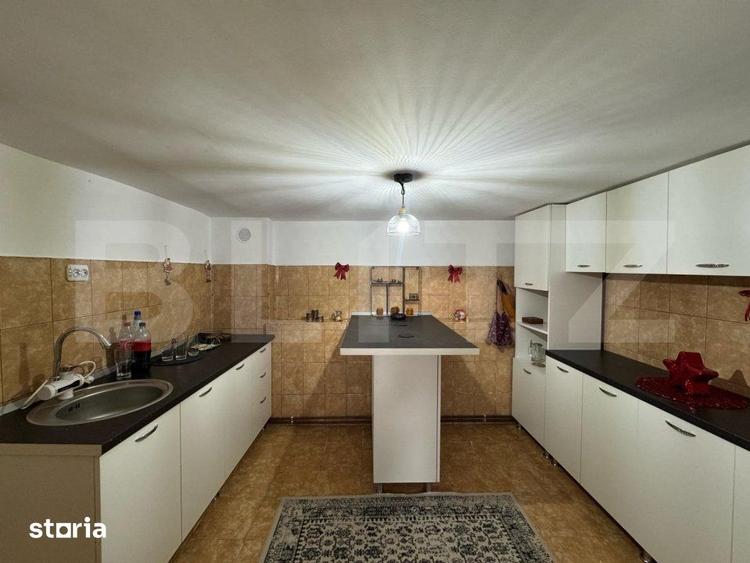 Casă cu 4 camere cu Teren 1000 Mp în Central