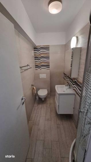 Apartament cu 2 camere decomandat în Podul de Fier
